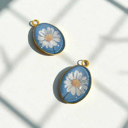GN02 - Pack of 2pcs - Daisy With Blue Background - Glass Pendants with Metal Base - ClartStudios - Polymer clay Jewellery