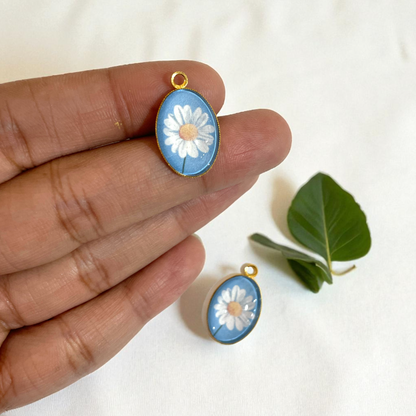 GN02 - Pack of 2pcs - Daisy With Blue Background - Glass Pendants with Metal Base - ClartStudios - Polymer clay Jewellery